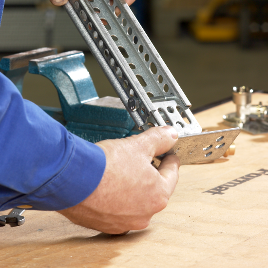 Clamp the various accessories onto the LEIFELD C-Profile Part# 1300 by using a nut and bolt (M8 x 60 mm Part# 1041) inserted as shown.