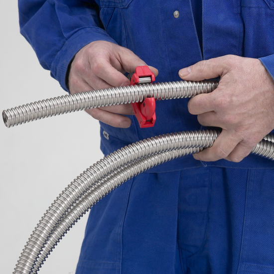 1. Rolled CSST is under tension. For a clean cut, first cut the pipe 2 corrugations longer than required. With a second cut remove the extra corrugations.