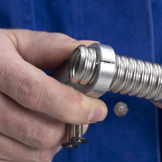 3. Exactly 2 corrugations are used to form the flange.	Don't forget to put the nut on before forming the flange!