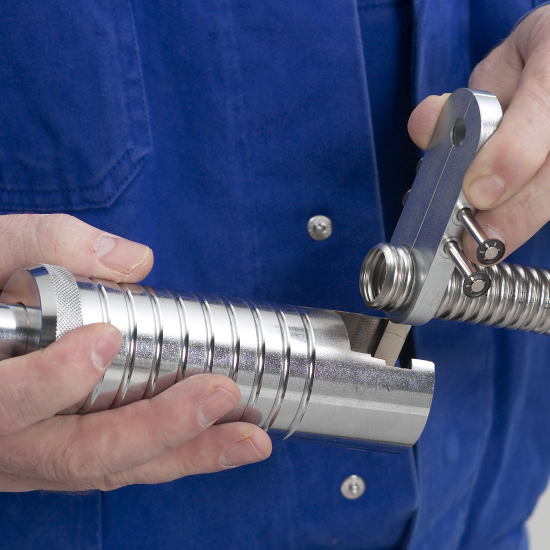 4. Slide the Flange Clamp into the Flange Tool as shown.